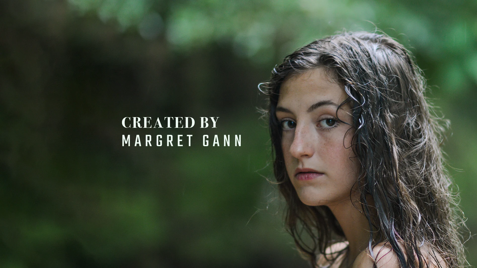 A portrait in a green landscape paired with a Created by Margret Gann title