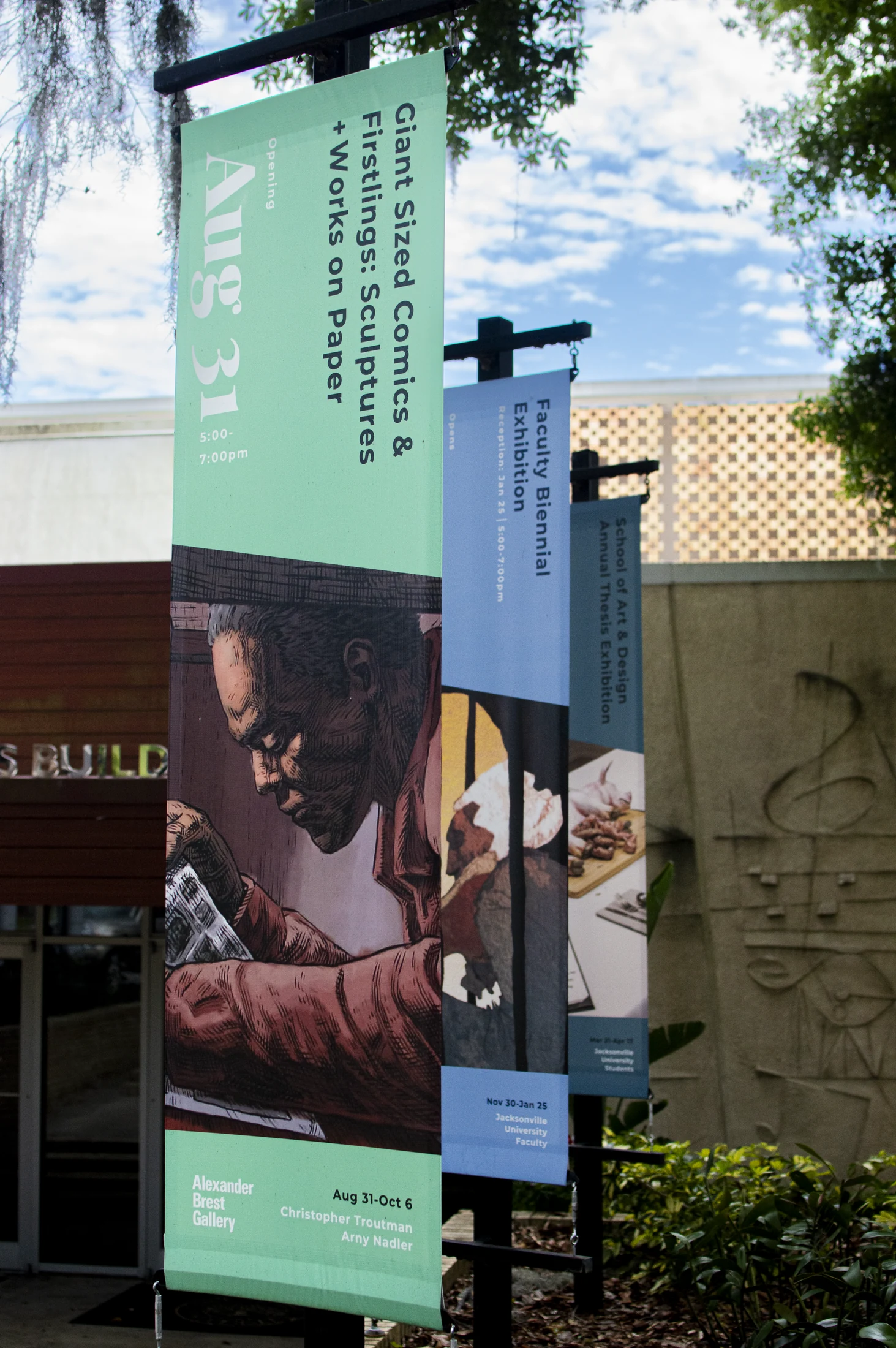 Green exhibition banner with diagonal image treatment